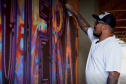 Oficina de grafitti estimula frequência escolar e fortalece cultura indígena em escola no oeste do estado