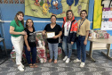 Cestas básicas arrecadadas na Corrida do Porto são distribuídas em Paranaguá