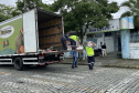 Cestas básicas arrecadadas na Corrida do Porto são distribuídas em Paranaguá
