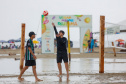 PRAIA COM CHUVA