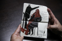 Fã da Orquestra Sinfônica do Paraná e de Beatles, artista ilustra concertos há mais de uma década