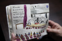 Fã da Orquestra Sinfônica do Paraná e de Beatles, artista ilustra concertos há mais de uma década