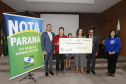 A coordenadora do Nota Paraná, Marta Gambini, entregou nesta quinta-feira (21) os três principais prêmios do 39.º sorteio de fevereiro.Curitiba, 21-02-19.Foto: Arnaldo Alves / ANPr.