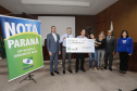 A coordenadora do Nota Paraná, Marta Gambini, entregou nesta quinta-feira (21) os três principais prêmios do 39.º sorteio de fevereiro.Curitiba, 21-02-19.Foto: Arnaldo Alves / ANPr.