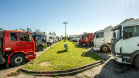 O movimento no Pátio de Triagem do Porto de Paranaguá, esta semana, passou dos três mil caminhões por dia. O volume é quase 67% maior que a média registrada normalmente, de até 2 mil veículos/dia, e resultado da boa fase do agronegócio brasileiro, principalmente no comércio de soja e milho.   -  Paranaguá, 19/06/2019  -  Foto: Cláudio Neves/Portos do Paraná
