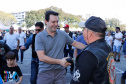 O governador Carlos Massa Ratinho Junior disse neste sábado (27) que o Governo do Paraná prepara, em parceria com motociclistas, uma agenda turística robusta para integrar ainda mais os clubes e potencializar as viagens ao encontro das belezas naturais do Estado. Ele participou das comemorações da 1ª Moto União, no Palácio Iguaçu, evento idealizado pelo Departamento de Trânsito do Paraná (Detran-PR) que passa a fazer parte do calendário estadual em razão do Dia do Motociclista.