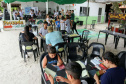 A empresa Portos do Paraná levou pela primeira vez o projeto Porto em Ação para além do continente. A comunidade beneficiada foi a de Encantadas, na Ilha do Mel. Nesta quarta-feira (4), os moradores tiveram acesso a exames clínicos e vacinação, além de corte de cabelo, aulas de xadrez, orientações sobre qualidade de vida e atividades físicas. Foto: Portos do Paraná