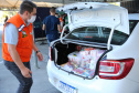 Entrega de cesta básica no drive-thru montado em Curitiba (Palácio Iguaçu). O projeto CESTA SOLIDÁRIA PARANÁ tem como objetivo principal mobilizar os funcionários do Estado do Paraná a participarem voluntariamente de uma ação de doação de cestas básicas. Curitiba - 18/05/2020 - Foto: Geraldo Bubniak/AEN