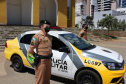 Histórias por trás da pandemia  - Na foto, a soldado Jana Scherer, de Pato Branco. Como auxiliar de comunicação social do 3o Batalhão de Polícia Militar do município, as ações administrativas tomavam boa parte do seu tempo. Com a pandemia e o reforço do policiamento para garantir o cumprimento das medidas de restrição, as operações nas ruas se tornaram mais frequentes.     -  Curitiba, 12/03/2021  -  Foto: Divulgação AEN