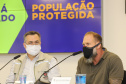 O secretário estadual de Saúde, Beto Preto, atende   a imprensa para explicar detalhes do Decreto 7.145/2021, publicado nesta sexta-feira (19). A normativa endurece as regras de isolamento social em municípios da Região Metropolitana de Curitiba. Na foto, o  delegado-geral da Polícia Civil do Paraná (PCPR), Silvio Jacob Rockembach . Foto: Geraldo Bubniak/AEN