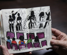 Fã da Orquestra Sinfônica do Paraná e de Beatles, artista ilustra concertos há mais de uma década