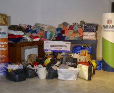 O Governo do Estado deu início oficialmente nesta quarta-feira (12) à campanha Aquece Paraná 2021. A iniciativa da Superintendência Geral de Ação Solidária (SGAS) busca arrecadar roupas, calçados, cobertores, roupas de cama e outros itens em bom estado de uso para destinar a pessoas em situação de vulnerabilidade social de todas as regiões do Estado. A cerimônia de abertura ocorreu por meio de um drive-thru na área externa do Teatro Guaíra.Foto Gilson Abreu/Aen